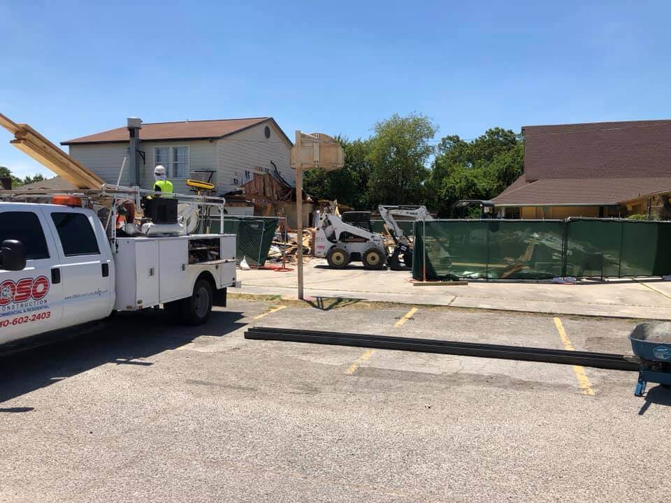 Portrait of line workers at commercial space