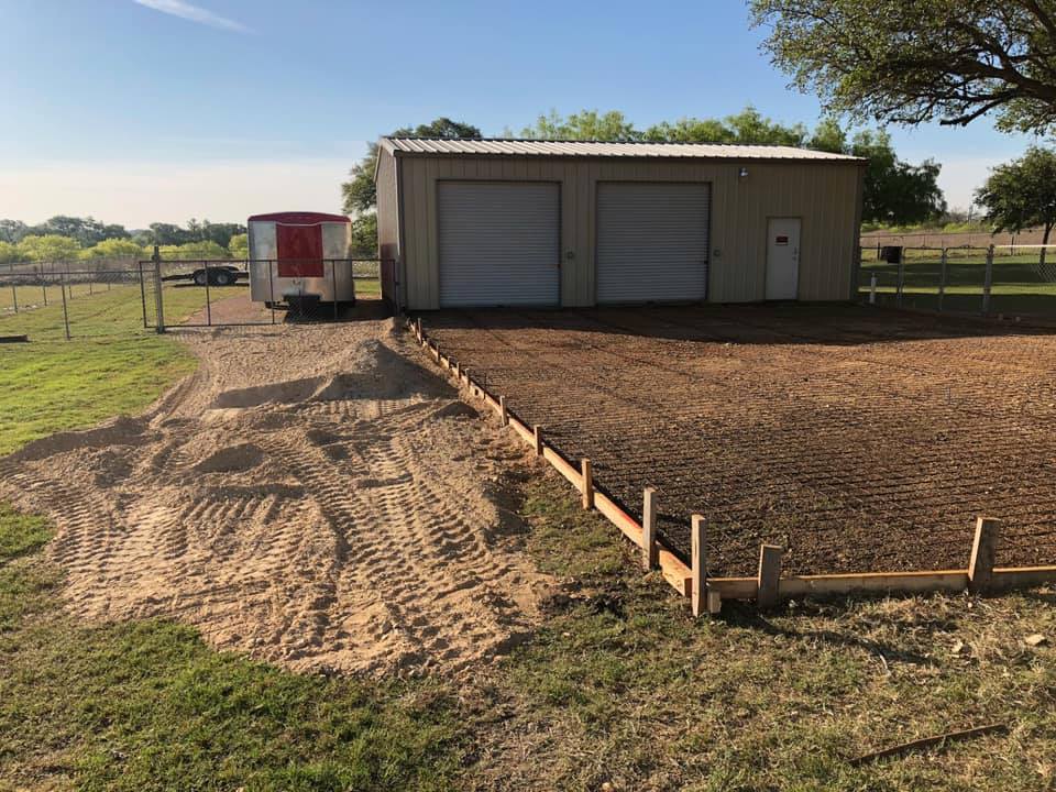 metal building and concrete driveway